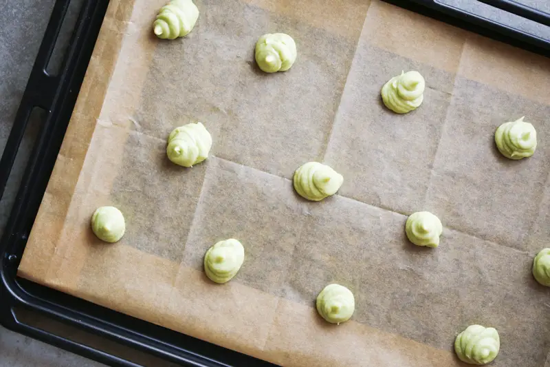 piped matcha cat's tongue cookie dough